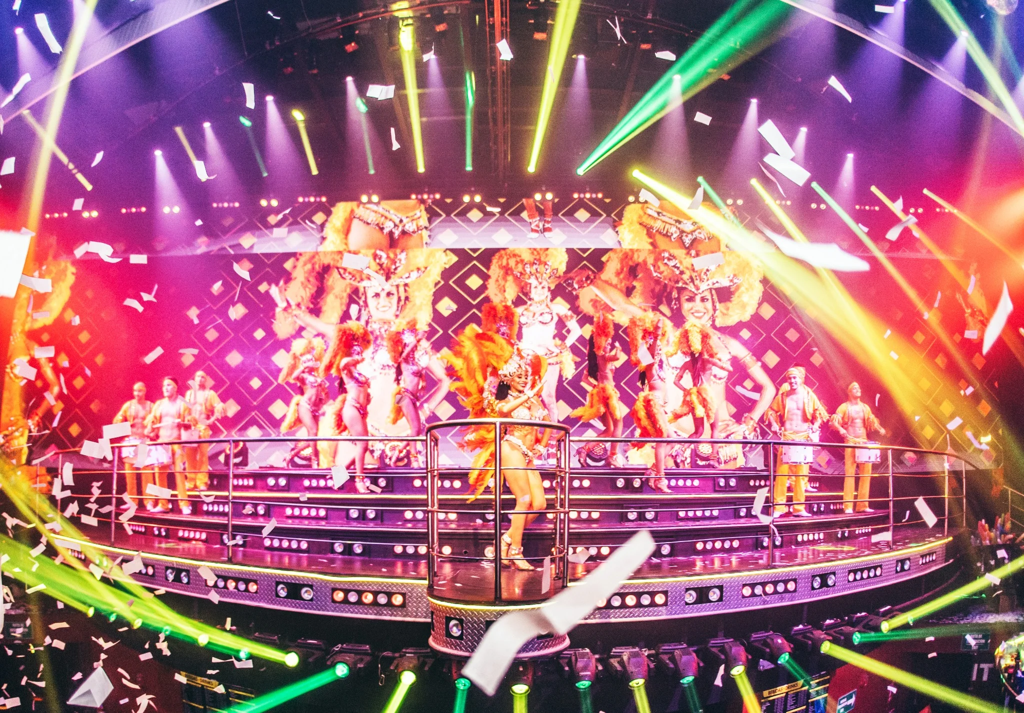 Urban dance performance on colorful stage at Coco Bongo Punta Cana