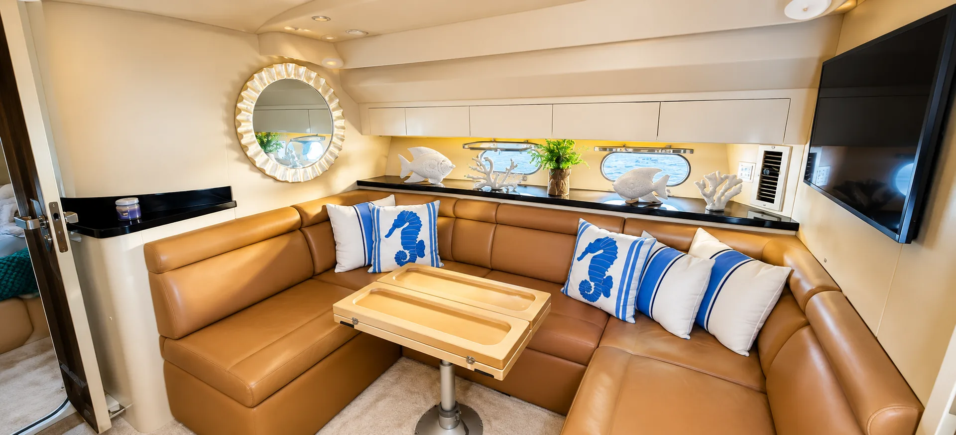 Interior lounge area inside a private yacht in Punta Cana