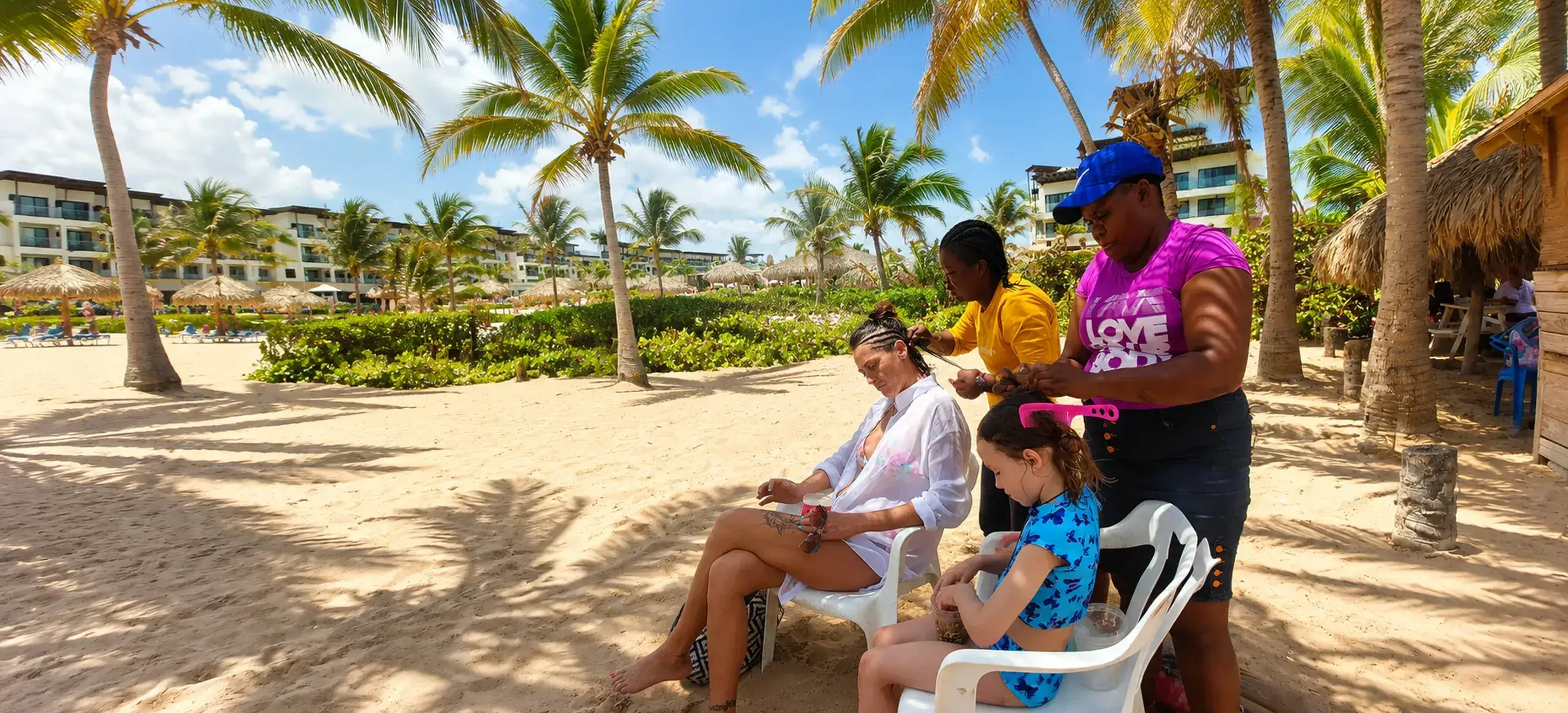 Traditional hair braiding service on a tropical Punta Cana beach