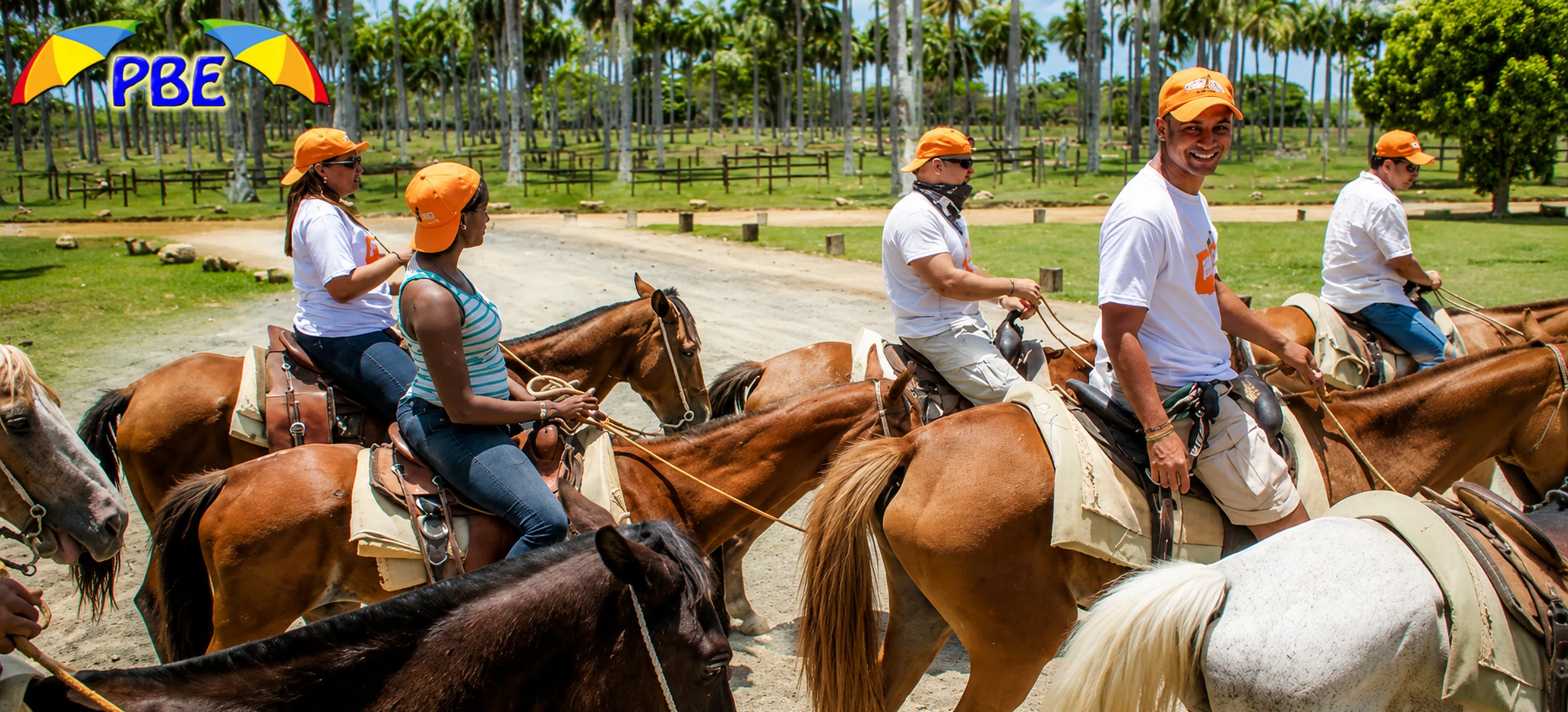 Horseback riding ranch in Punta Cana with guests preparing for a tropical riding excursion