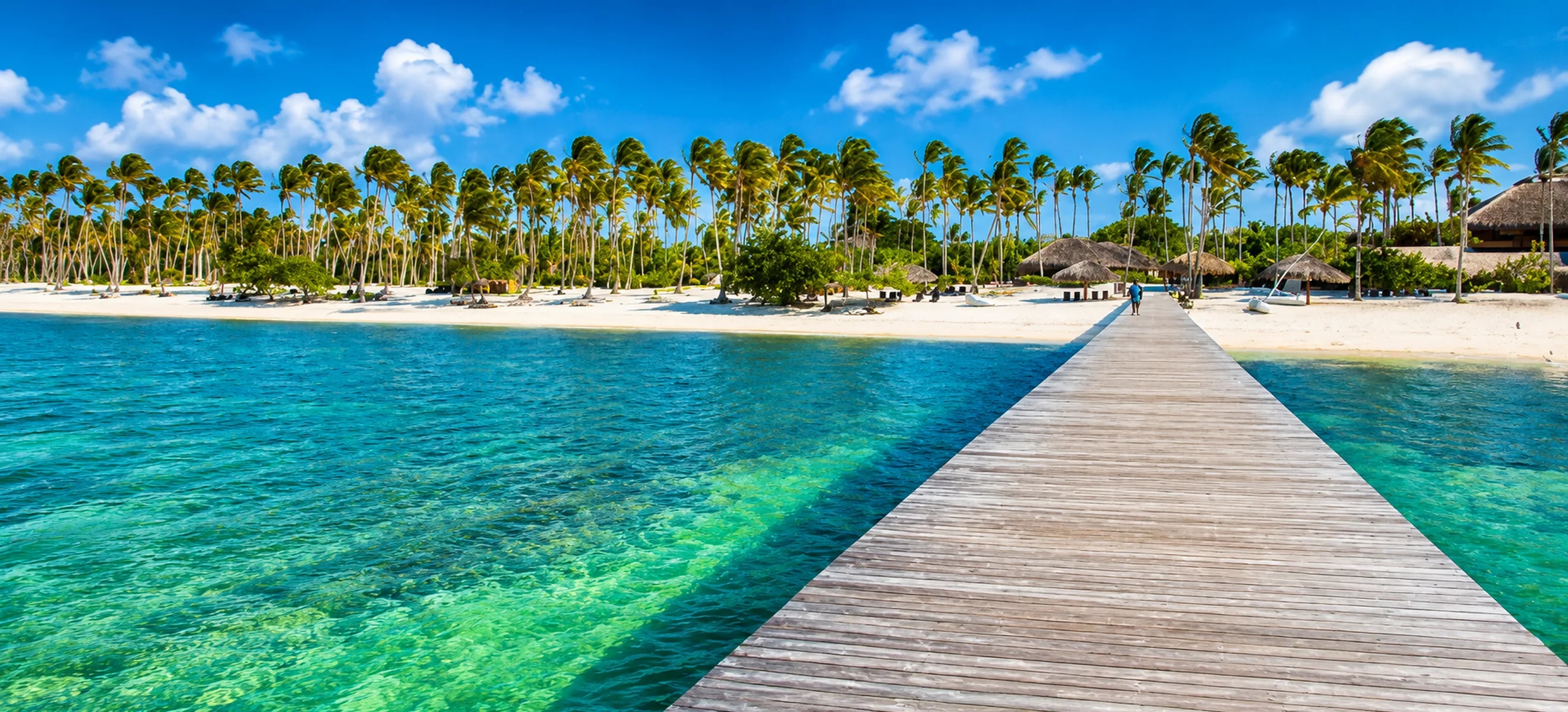 Tropical pier and turquoise water at Dolphin Explorer Punta Cana